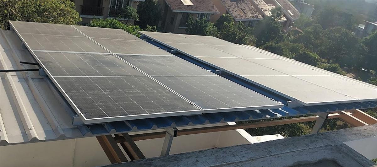 A galvanized MS frame designed for a rooftop solar panel installation.